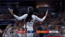 a female basketball player wearing a number 25 jersey