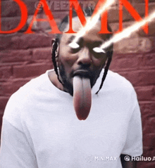 a man with a long tongue sticking out is on the cover of a damn album