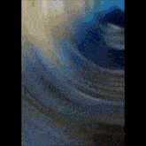 a painting of a swirl of blue and yellow