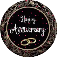 a black circle with the words happy anniversary and two wedding rings