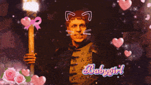 a man holding a torch with a cat face and the word babygirl written in pink