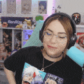 a woman wearing headphones and a t-shirt that says renrize on it