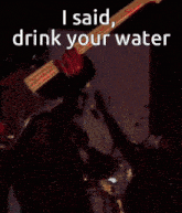 a poster that says i said drink your water in white letters