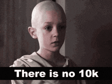 a child with a shaved head and the words " there is no 10k "