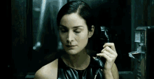 the matrix carrie anne moss trinity telephone stop