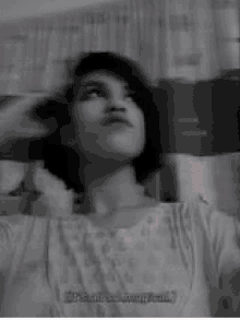 a black and white photo of a woman with the words " hi bii " written on it