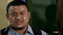 a man with bandages on his face and the word bull on the bottom left