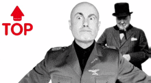 a bald man in a military uniform stands in front of a top hat