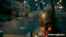 a close up of a batman with make a gif.com on the bottom