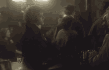 a man sits at a bar with the words so you bloody well written above him