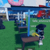 a group of people are playing a video game and one of them is called sara