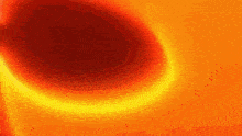 a red and yellow swirl on a bright orange background