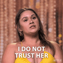 a woman in a yellow bikini says that she does not trust her