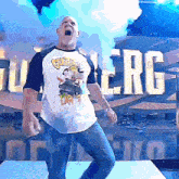 a man is standing in front of a sign that says ' berg ' on it