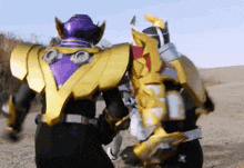 a purple and gold robot is standing next to another robot in a field
