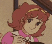 a cartoon girl in a pink dress is holding chopsticks and a bowl of food .