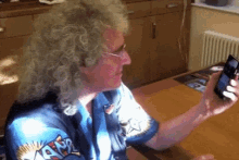 Brian May Queen GIF - Brian May Queen Cellphone GIFs