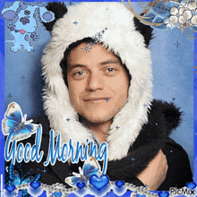 a picture of a man wearing a panda hat with the words good morning written on it