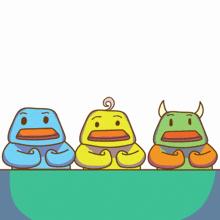 a group of monsters are sitting in a row and the word more is above them