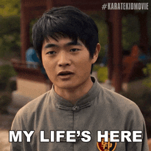 a man says " my life 's here " in front of a karate kid movie poster