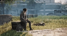 a video game scene with a man sitting on a barrel and the words by some miracle