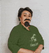 a woman with a fake beard and mustache is wearing a green shirt that says " пивозавр "