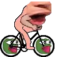 a pixel art of a person riding a bicycle with a frog face on the front .