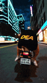 a dog wearing a dea hat is riding a motorcycle down a street