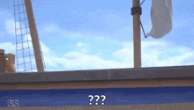 a boat is floating on top of a body of water with the words `` ss '' written on it .