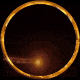 a gold circle with a swirl in the middle of it