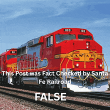 a red and yellow train with the number 100 on the front
