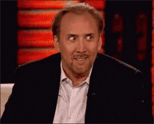 Nicolas Cage Awkward Smile GIF - Nicolas Cage Awkward Smile Looking GIFs
