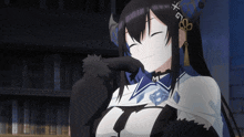 a girl with long black hair and a crown with the letter m on it