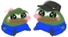 two frogs are sitting next to each other wearing hats and sweaters .