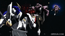 a gif from gifrun.com shows two robots fighting
