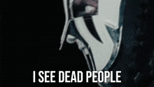 a man in a mask with the words i see dead people on the bottom