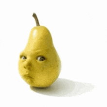 a pear with a face on it on a white background .