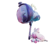 a stuffed bunny is sitting next to a purple object with a cross on it