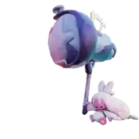a stuffed bunny is sitting next to a purple object with a cross on it