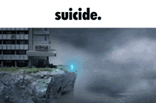 a picture of a cliff with the word suicide on it