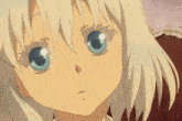 a close up of a girl 's face with blue eyes and white hair
