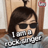 a girl wearing sunglasses and a ponytail says i am a rock singer