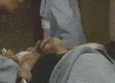a person is laying on a stretcher in a hospital