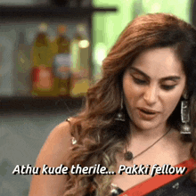 a woman says " athu kude therile pakki fellow " while looking down