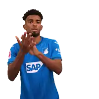a man wearing a blue shirt with the word sap on the front