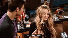 a girl says it 's too much in front of a man