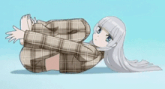 a girl with long white hair is laying on her stomach in a plaid shirt and pajamas .