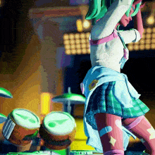 a girl in a plaid skirt is dancing in front of drums