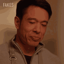 Smirking Wei Li GIF - Smirking Wei Li Fakes GIFs