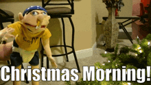 a christmas morning greeting with a puppet